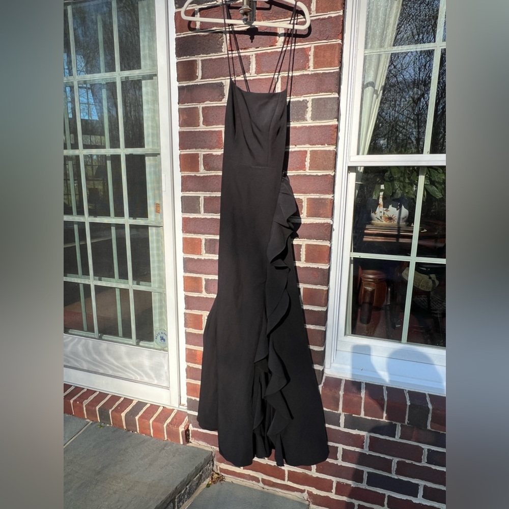 Black dress; floor length with a leg slit; worn once for a wedding